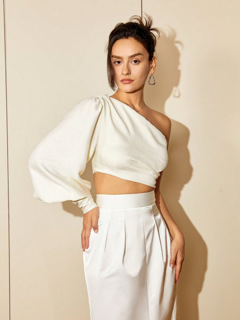 AEL Pleated high waisted mid length style with a front split skirt