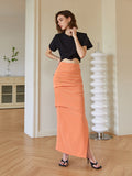 Simple and all-purpose show slim tuck hip skirt 2023 summer new style slit show thin skirt